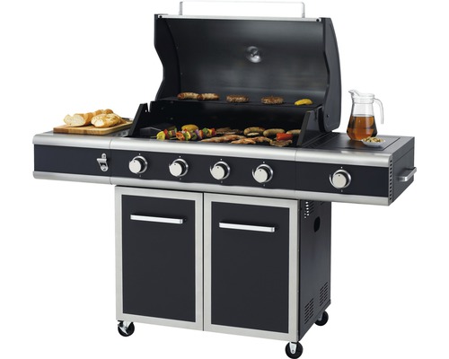 Gasgrill mit Grillgut und Zubehör