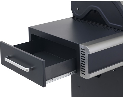 Detailansicht eines geöffneten Schubfachs in einem Grill