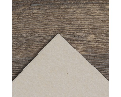 Beige Bodenfliese auf Holzuntergrund