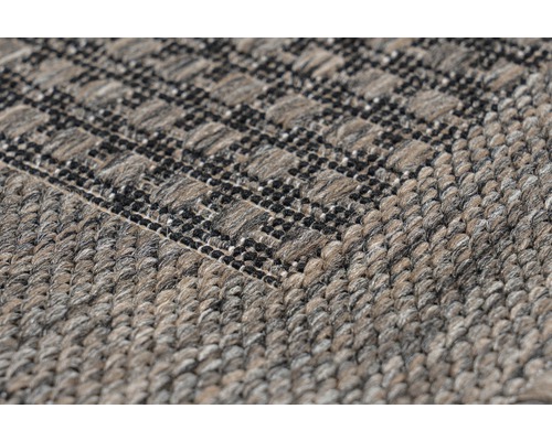 Nahaufnahme eines gemusterten Teppichs mit Textur