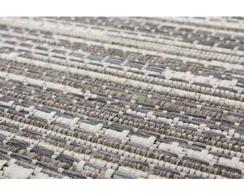 Nahaufnahme eines Teppichs mit gewebtem Muster