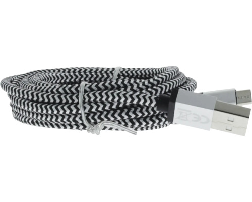 Aufgerolltes USB-A zu Micro-USB-Kabel mit schwarz-weißem Zickzack-Textilgeflecht.