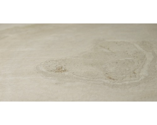 Nahaufnahme einer beigen Keramikfliese mit matter Oberfläche