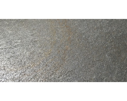 Nahaufnahme einer grauen Steinfliesenoberfläche