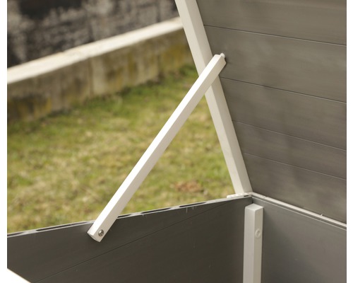 Detailansicht einer grauen Gartentruhe mit weißem Rahmen