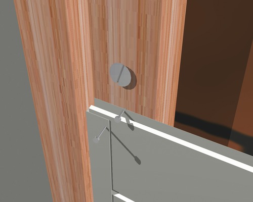 Detailansicht einer Türbefestigung mit Schrauben