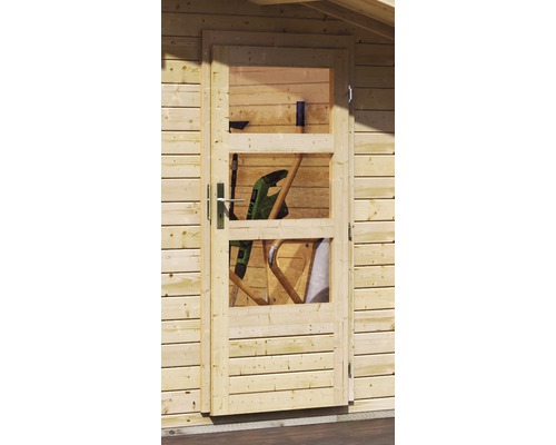 Holztür mit Glaseinsätzen in einem Gartenhaus