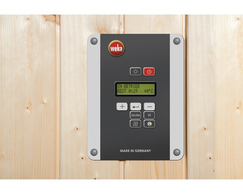 Weka Logo auf einer Sauna Steuerung an einer Holzwand