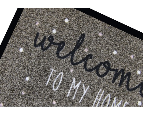 Fußmatte mit der Aufschrift Willkommen in meinem Zuhause