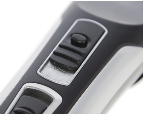 Detailaufnahme einer Haarschneidemaschine mit Schalter zur Längeneinstellung bis zehn Millimeter.