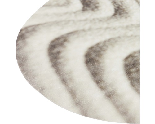 Detailaufnahme einer Tischoberfläche mit gewelltem Muster