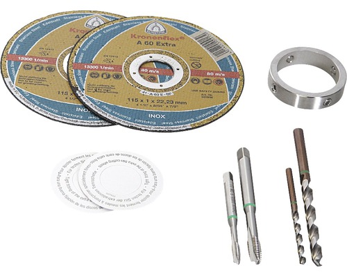 Zwei Trennscheiben, ein Metallring und verschiedene Bohrer