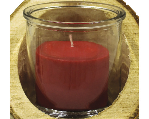 Dekorative Kerze in Glas mit Holzsockel