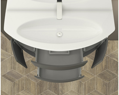 Waschtisch mit geöffneten Schubladen und Unterschrank im Badezimmer