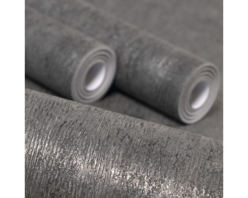 Drei Rollen grauer Vliestapete mit Struktur