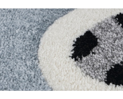 Detailansicht eines Teppichs mit Fußballmuster