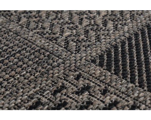 Nahaufnahme eines Teppichs mit geometrischem Muster