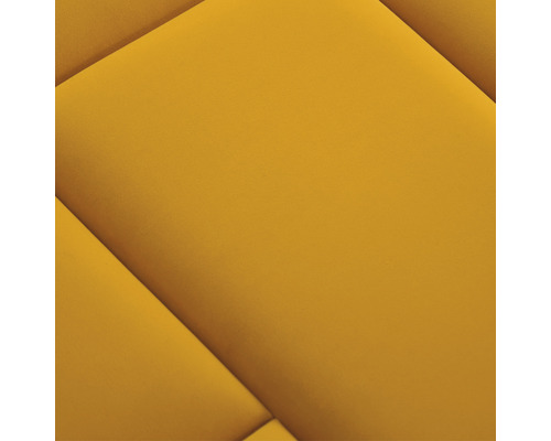 Gelbe, gepolsterte Wandpaneele mit geometrischem Muster.