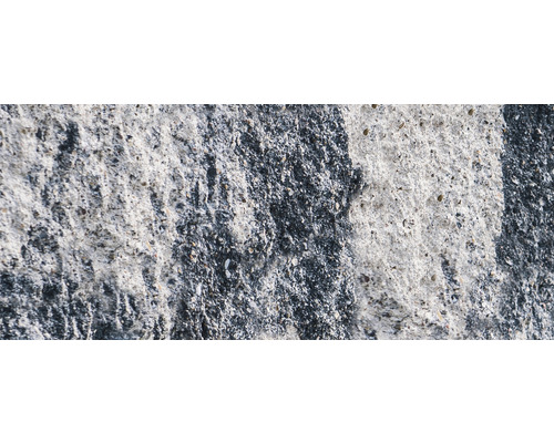 Nahaufnahme einer Betonwand mit grober Textur