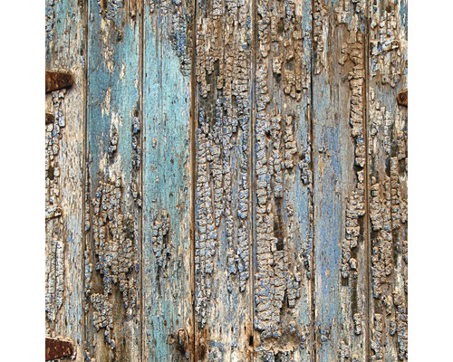 Nahaufnahme einer alten Holztür mit abblätternder Farbe