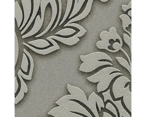 Detailansicht einer geprägten Vinyltapete mit floralem Muster.