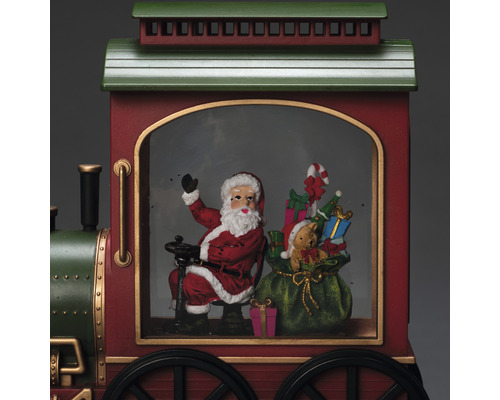 Weihnachtliche Eisenbahn mit Weihnachtsmann, Geschenken und Teddybär