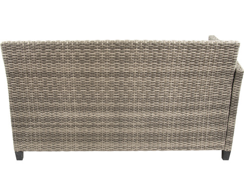 Rückansicht eines grauen Sofas mit Rattangeflecht