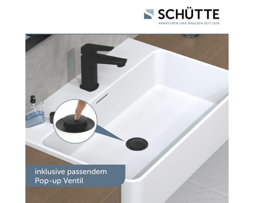 Weißes Waschbecken mit schwarzer Armatur und inklusivem Pop-up Ventil