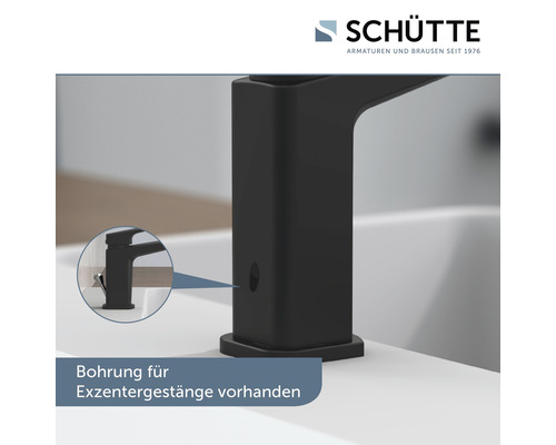 Schütte Logo. Schwarze Waschtischarmatur mit Bohrung für Exzentergestänge.