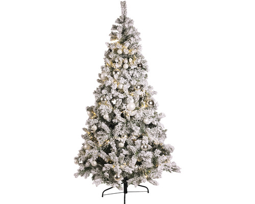 Geschmückter, schneebedeckter Weihnachtsbaum mit Christbaumkugeln und Beleuchtung.