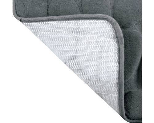 Detailansicht einer grauen Badematte mit rutschfester Unterseite