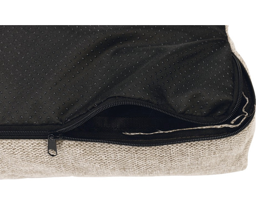 Detailansicht eines Hundebetts mit Reißverschluss und rutschfester Unterseite.