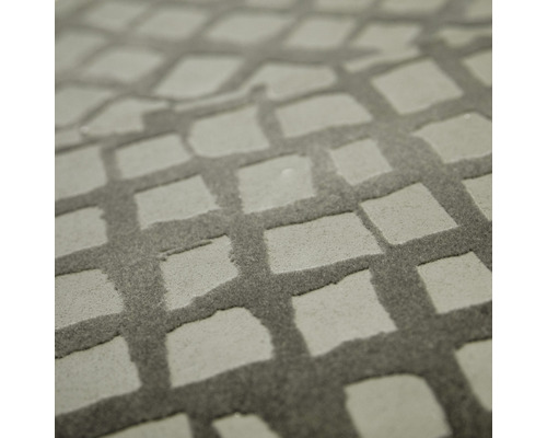 Nahaufnahme eines Teppichs mit quadratischem Muster