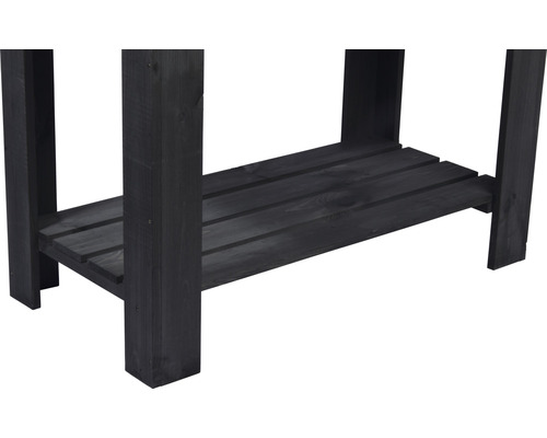 Detailansicht eines schwarzen Pflanztisches aus Holz mit Ablagefläche