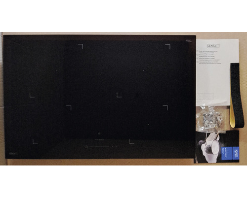 Schwarzes Kochfeld mit Zubehör für den Einbau