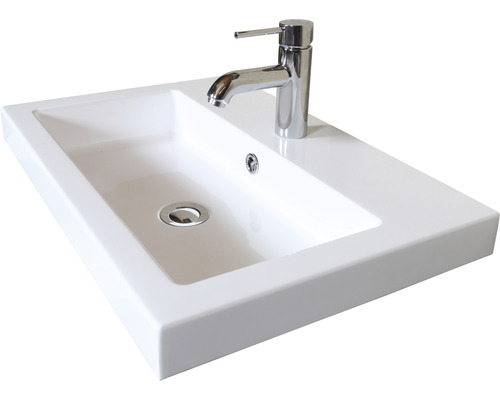 Weißes Aufsatzwaschbecken mit Armatur
