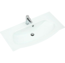 Waschbecken aus Keramik mit Armatur