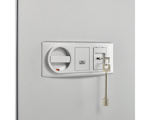 Detailansicht eines Tresorschlosses mit Schlüssel