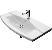 Weißes Aufsatzwaschbecken mit Armatur