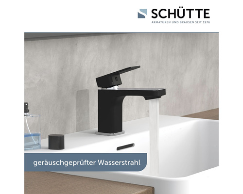 Schwarzer Waschtischmischer mit laufendem Wasserhahn im Badezimmer