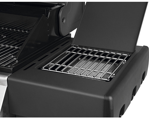 Detailansicht eines Gasgrills mit Warmhalterost