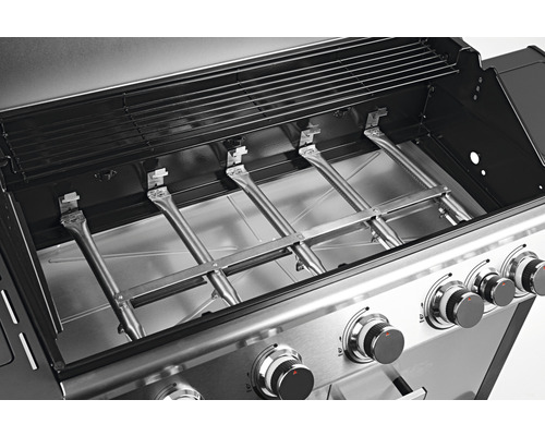 Innenansicht eines Gasgrills mit Grillrost und Brennern