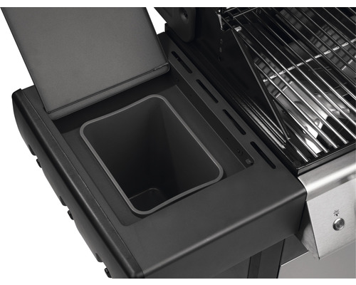 Detailaufnahme eines Grills mit Fettauffangbehälter und Grillrost