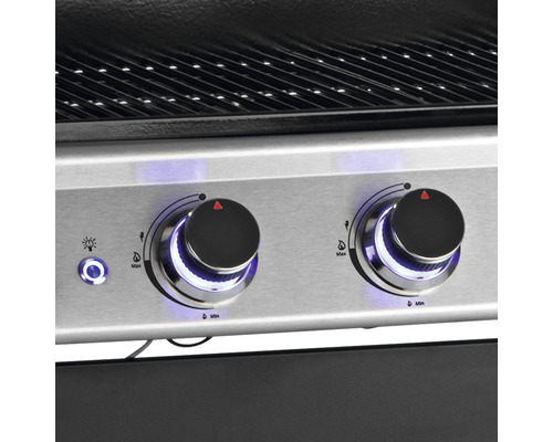 Nahaufnahme von zwei Drehknöpfen zur Temperaturregelung an einem Grill.