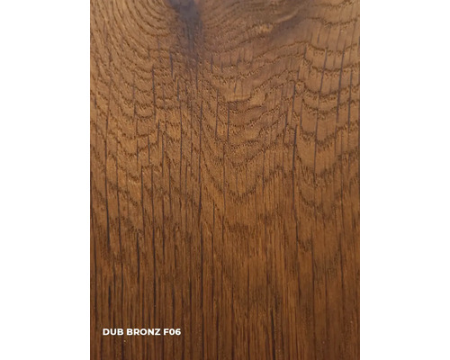 Nahaufnahme einer Holzoberfläche in Bronze-Optik mit der Bezeichnung Dub Bronz F06