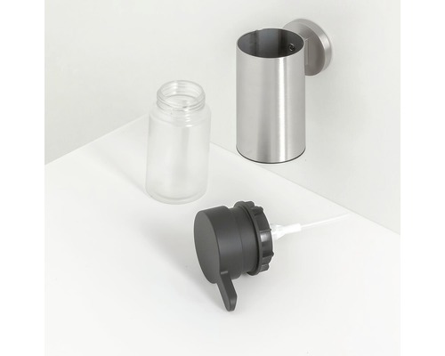 Seifenspender zur Wandmontage mit leerem Glasbehälter und Dosierkopf