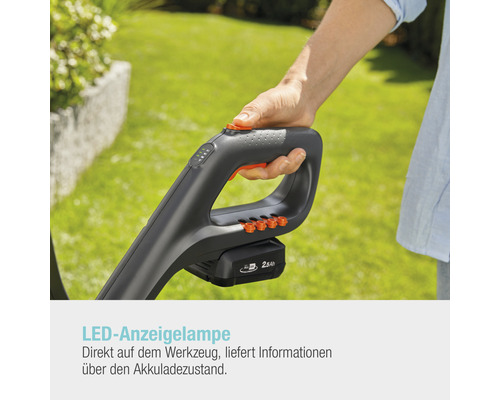Nahaufnahme eines Akku-Rasentrimmers mit LED-Anzeigeleuchte