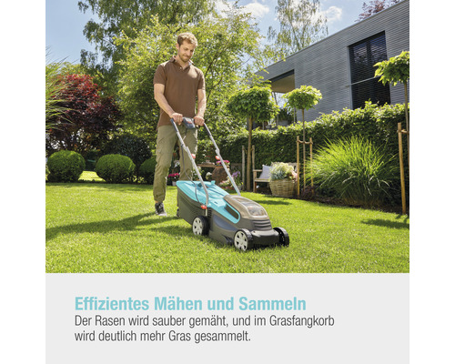 Ein Mann mäht Rasen mit einem Rasenmäher im Garten.