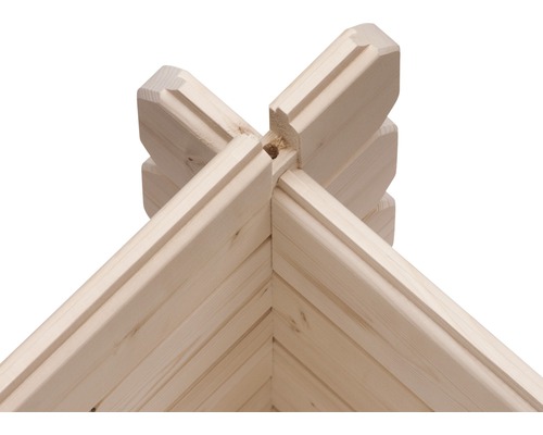 Detailansicht einer Eckverbindung eines Holzhauses