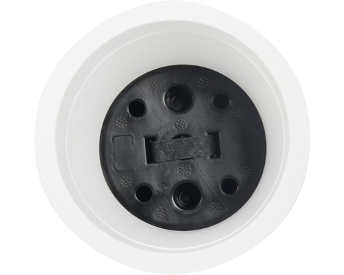 Blick auf die schwarze Basis einer LED-Lampe in einem weißen Lampenschirm